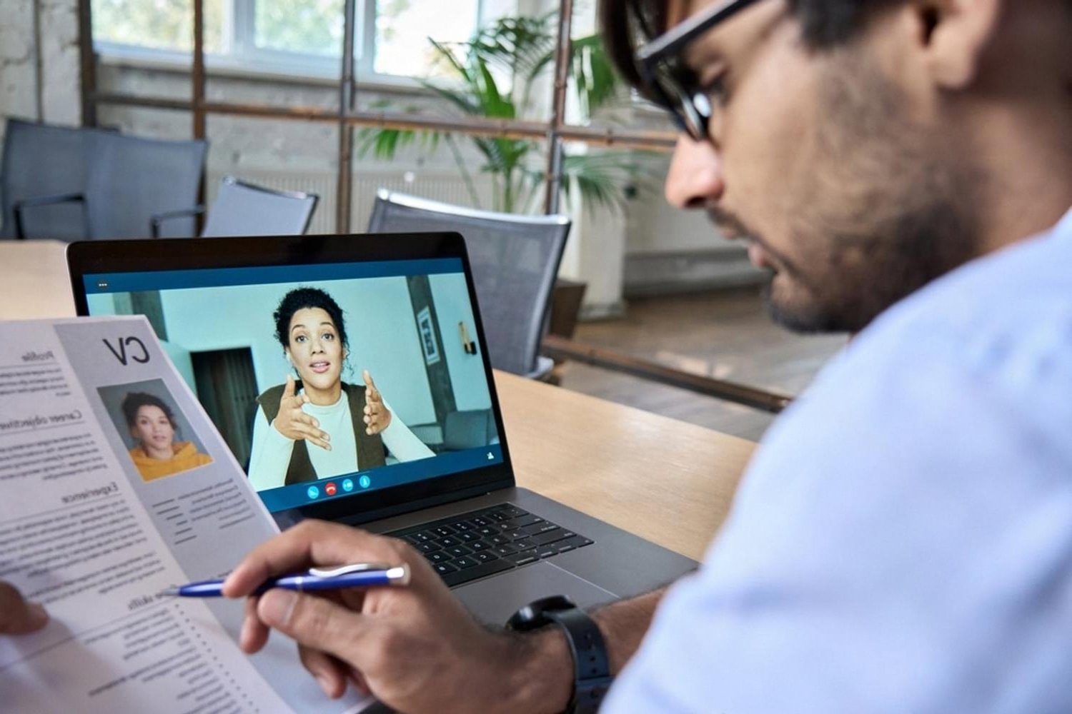 Investigator conducting a remote reputational screening interview via video call